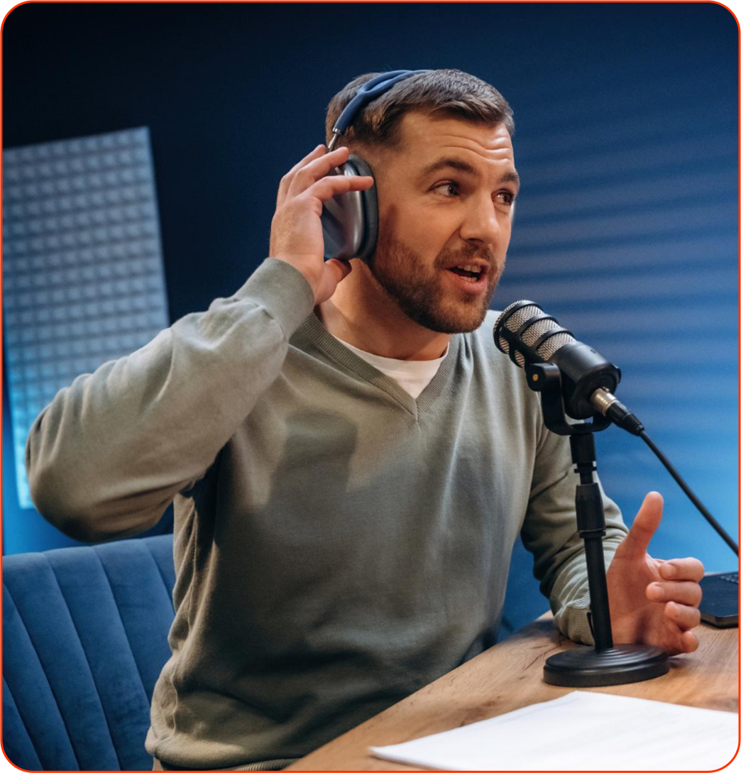 YouTube interview guest speaking into a studio microphone